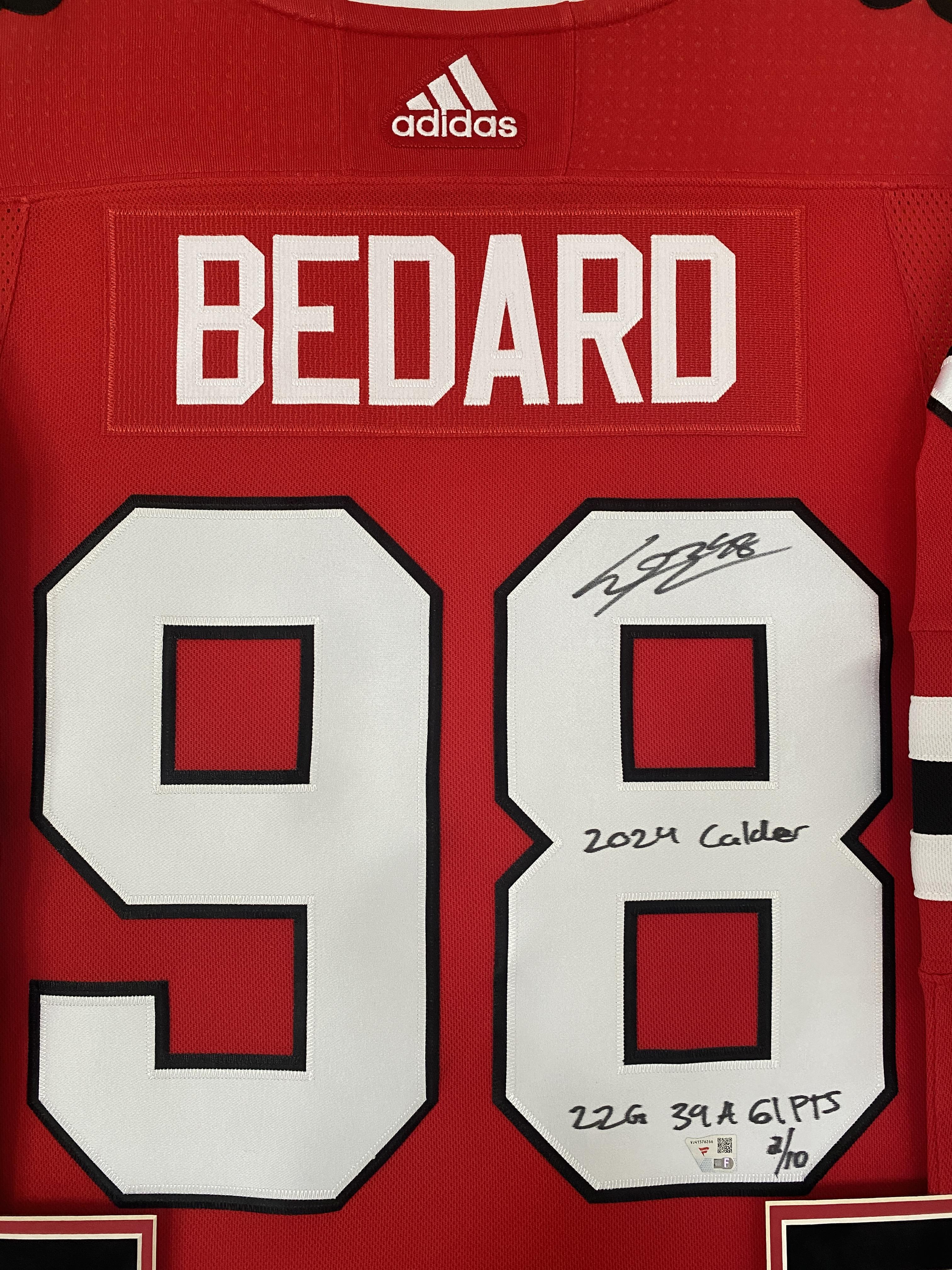 Connor Bedard Signed LE Blackhawks Custom Framed Adidas Authentic Jersey Inscribed "2024 Calder" & "22G 39A 61PTS" (Fanatics) at PristineAuction.com Connor Bedard Signed LE Blackhawks Custom Framed Adidas Authentic Jersey Inscribed "2024 Calder" & "22G 39A 61PTS" (Fanatics) at PristineAuction.com