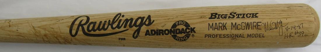 Mark McGwire Signed Rawlings Player Model Baseball Bat Inscribed "8-14-87 HR #39" (JSA) at PristineAuction.com Mark McGwire Signed Rawlings Player Model Baseball Bat Inscribed "8-14-87 HR #39" (JSA) at PristineAuction.com