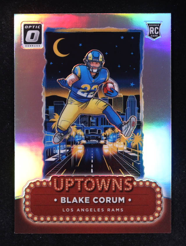 Blake Corum 2024 Donruss Optic Uptowns #14 RC at PristineAuction.com Blake Corum 2024 Donruss Optic Uptowns #14 RC at PristineAuction.com