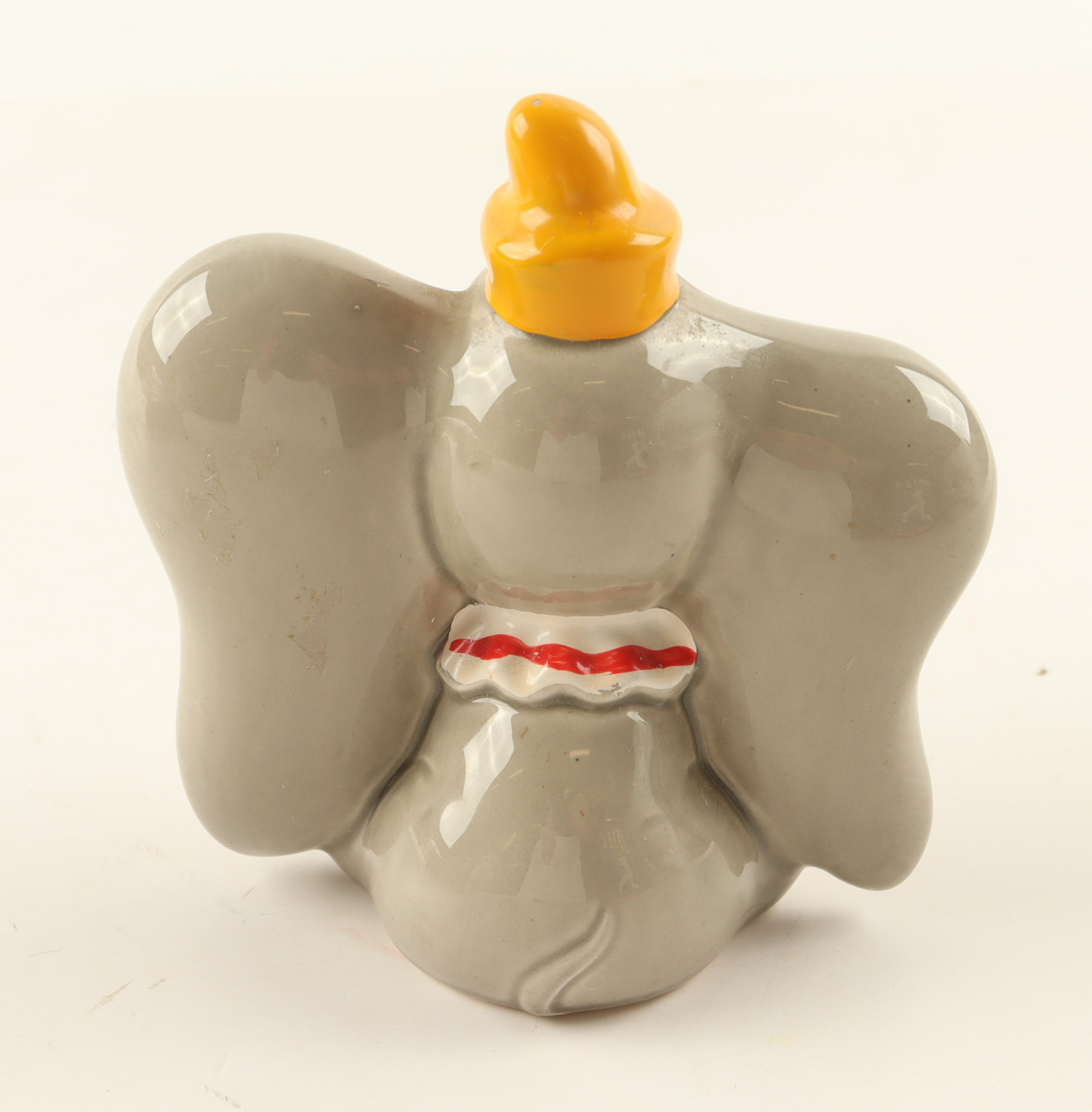 Walt Disney's Dumbo the Flying Elephant Ceramic Figurine with Display Case at PristineAuction.com Walt Disney's Dumbo the Flying Elephant Ceramic Figurine with Display Case at PristineAuction.com