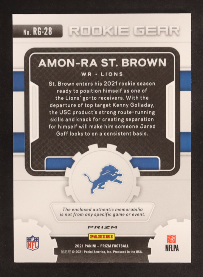 Amon-Ra St. Brown 2021 Panini Prizm Rookie Gear #28 RC at PristineAuction.com Amon-Ra St. Brown 2021 Panini Prizm Rookie Gear #28 RC at PristineAuction.com