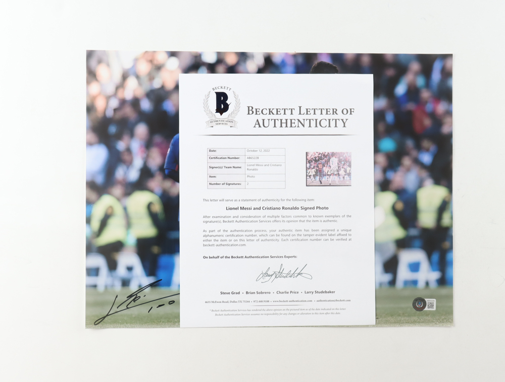 Cristiano Ronaldo & Lionel Messi Signed 12x16 Photo (Beckett) at PristineAuction.com Cristiano Ronaldo & Lionel Messi Signed 12x16 Photo (Beckett) at PristineAuction.com