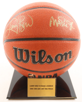 Larry Bird & Magic Johnson Signed Basketball With Acrylic Display Stand (Beckett & PSA) at PristineAuction.com