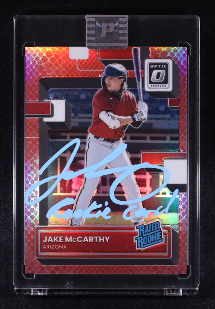 Jake McCarthy Signed 2022 Donruss Optic Red Dragon #73 #36/99 RR RC Inscribed "Rookie Card" (PA) at PristineAuction.com Jake McCarthy Signed 2022 Donruss Optic Red Dragon #73 #36/99 RR RC Inscribed "Rookie Card" (PA) at PristineAuction.com
