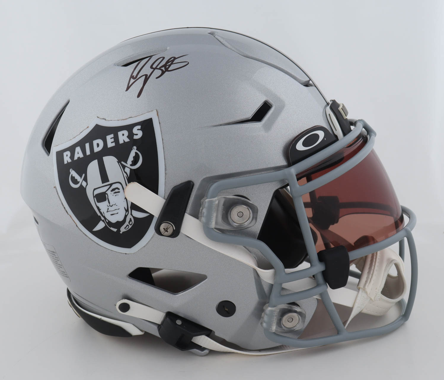 Geno Smith Signed Raiders Full-Size Authentic On-Field Speed-Flex Helmet With Oakley Visor (Beckett) at PristineAuction.com Geno Smith Signed Raiders Full-Size Authentic On-Field Speed-Flex Helmet With Oakley Visor (Beckett) at PristineAuction.com
