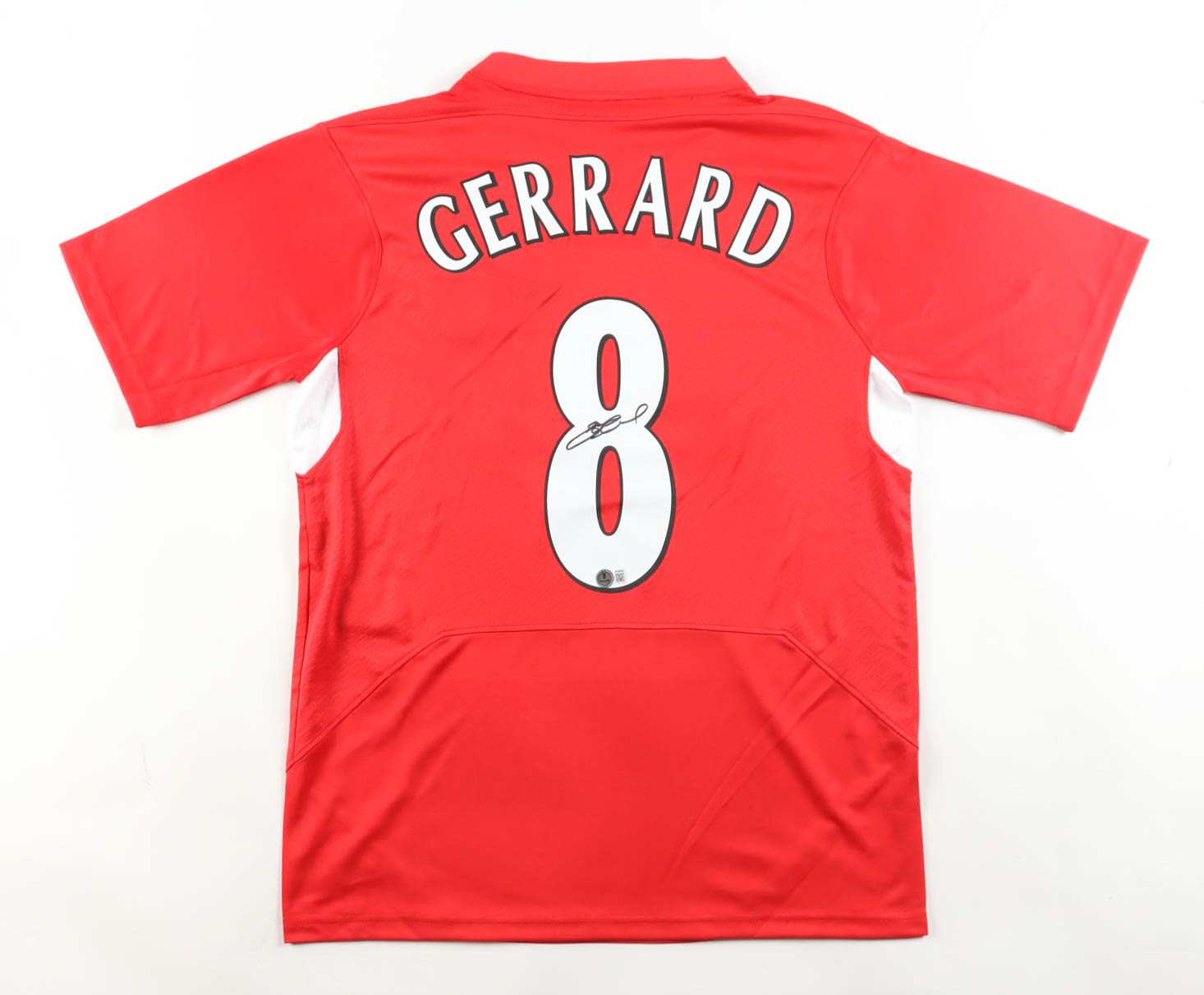 Steven Gerrard Signed Liverpool F.C. Reebok Authentic Jersey (Beckett) at PristineAuction.com Steven Gerrard Signed Liverpool F.C. Reebok Authentic Jersey (Beckett) at PristineAuction.com