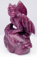 258.65 Carats Natural Ruby Night Fury Dragon Carving | Estimated Retail Value: $900 (UGL Cert) at PristineAuction.com