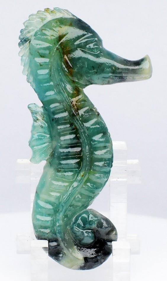 37.86 Carats Natural Grandidierite Seahorse Carving at PristineAuction.com 37.86 Carats Natural Grandidierite Seahorse Carving at PristineAuction.com