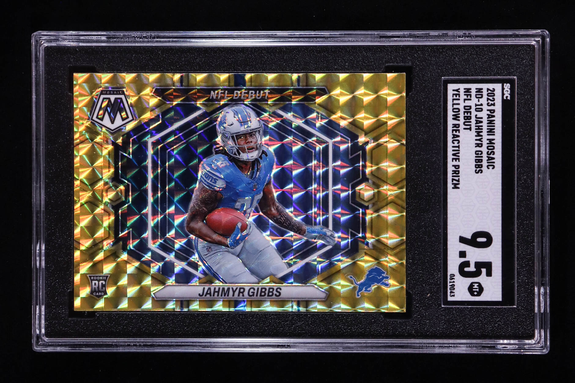 Jahmyr Gibbs 2023 Panini Mosaic NFL Debut Mosaic Reactive Yellow #10 RC (SGC 9.5) at PristineAuction.com Jahmyr Gibbs 2023 Panini Mosaic NFL Debut Mosaic Reactive Yellow #10 RC (SGC 9.5) at PristineAuction.com