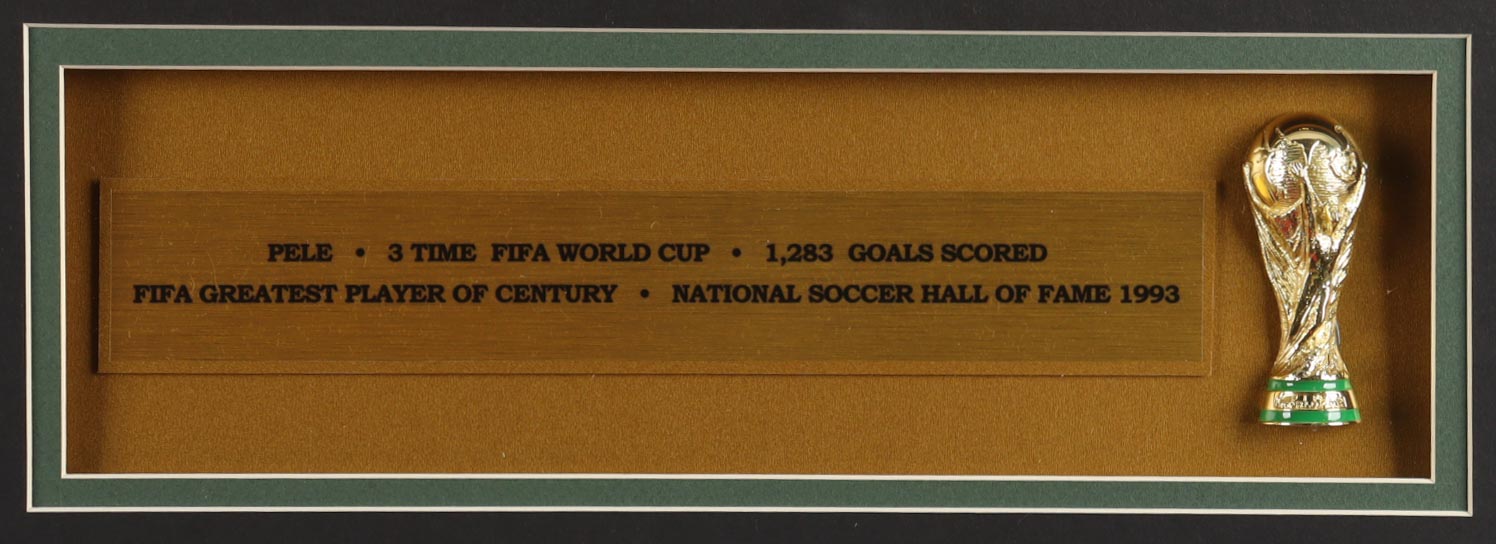 Pele Signed Custom Framed Jersey Display with World Cup Trophy Pin (PSA) at PristineAuction.com Pele Signed Custom Framed Jersey Display with World Cup Trophy Pin (PSA) at PristineAuction.com