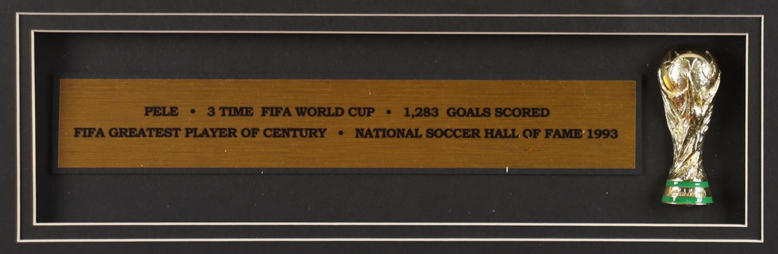 Pele Signed Custom Framed Jersey Display with World Cup Trophy Pin (PSA) at PristineAuction.com Pele Signed Custom Framed Jersey Display with World Cup Trophy Pin (PSA) at PristineAuction.com