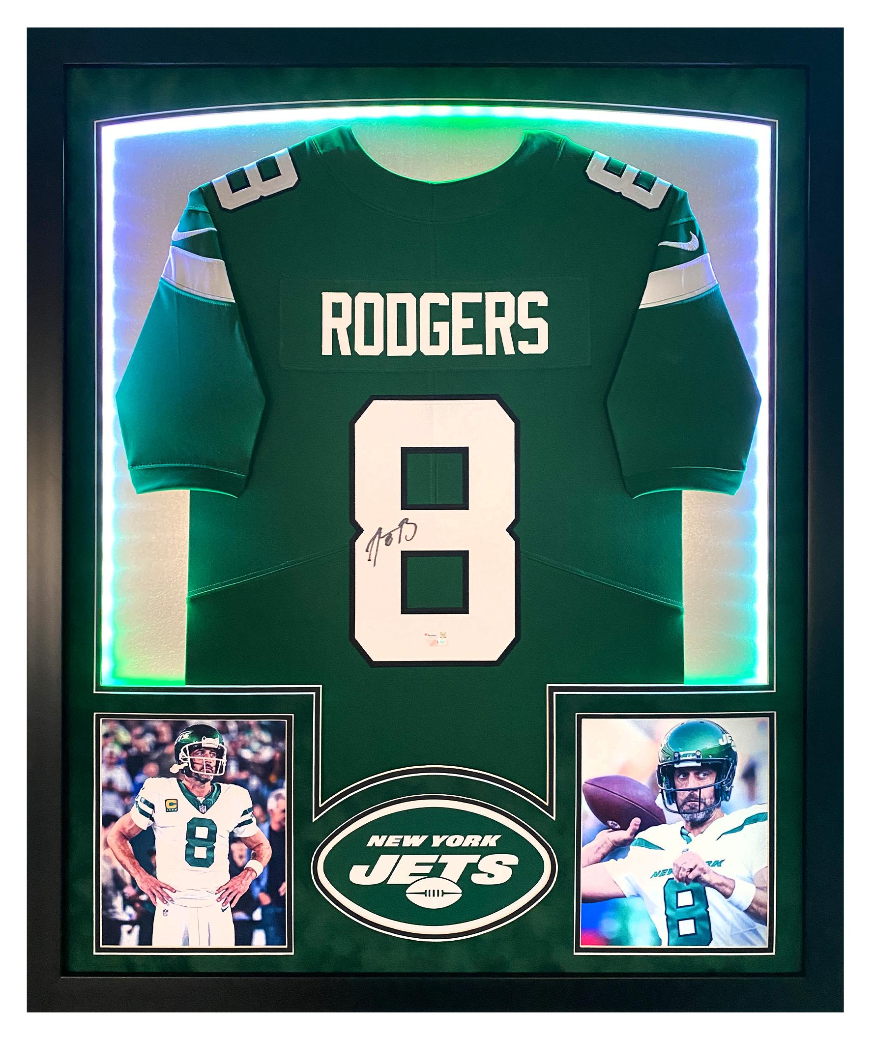 Aaron Rodgers Signed Jets Custom Framed Jersey Display with LED Lights (Fanatics) at PristineAuction.com Aaron Rodgers Signed Jets Custom Framed Jersey Display with LED Lights (Fanatics) at PristineAuction.com