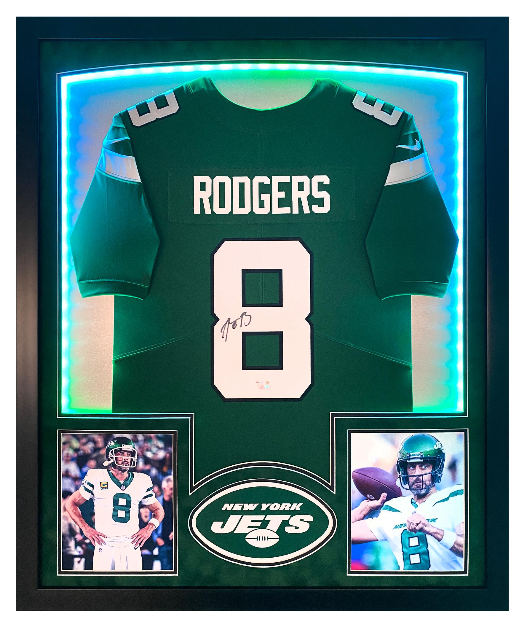 Aaron Rodgers Signed Jets Custom Framed Jersey Display with LED Lights (Fanatics) at PristineAuction.com Aaron Rodgers Signed Jets Custom Framed Jersey Display with LED Lights (Fanatics) at PristineAuction.com