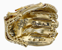 Ozzie Smith Signed Mini Gold Baseball Glove (Fanatics) at PristineAuction.com