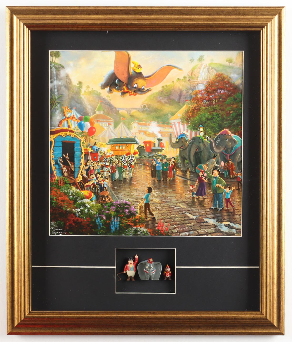 Thomas Kinkade "Dumbo the Flying Elephant" Custom Framed Print Display with Set Of (3) 1960 Dumbo Figurines at PristineAuction.com Thomas Kinkade "Dumbo the Flying Elephant" Custom Framed Print Display with Set Of (3) 1960 Dumbo Figurines at PristineAuction.com