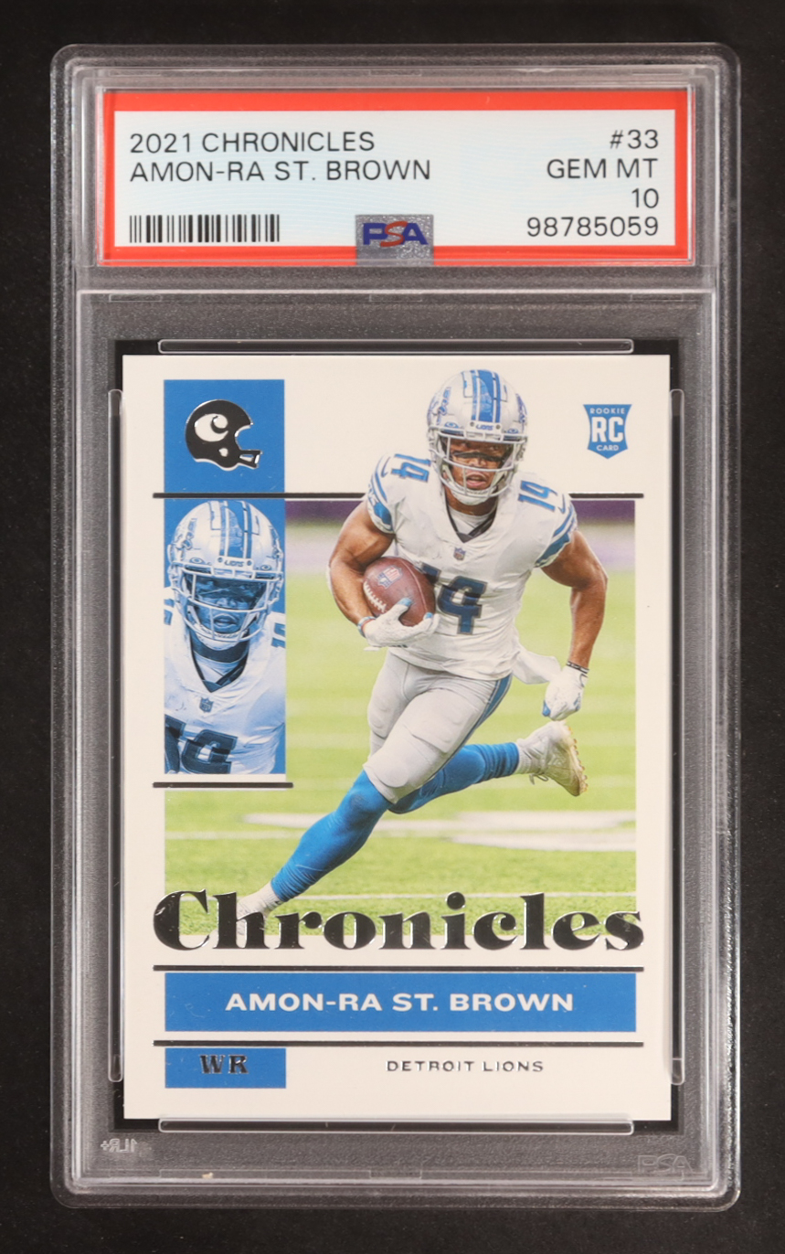 Amon-Ra St. Brown 2021 Panini Chronicles #33 RC (PSA 10) at PristineAuction.com Amon-Ra St. Brown 2021 Panini Chronicles #33 RC (PSA 10) at PristineAuction.com