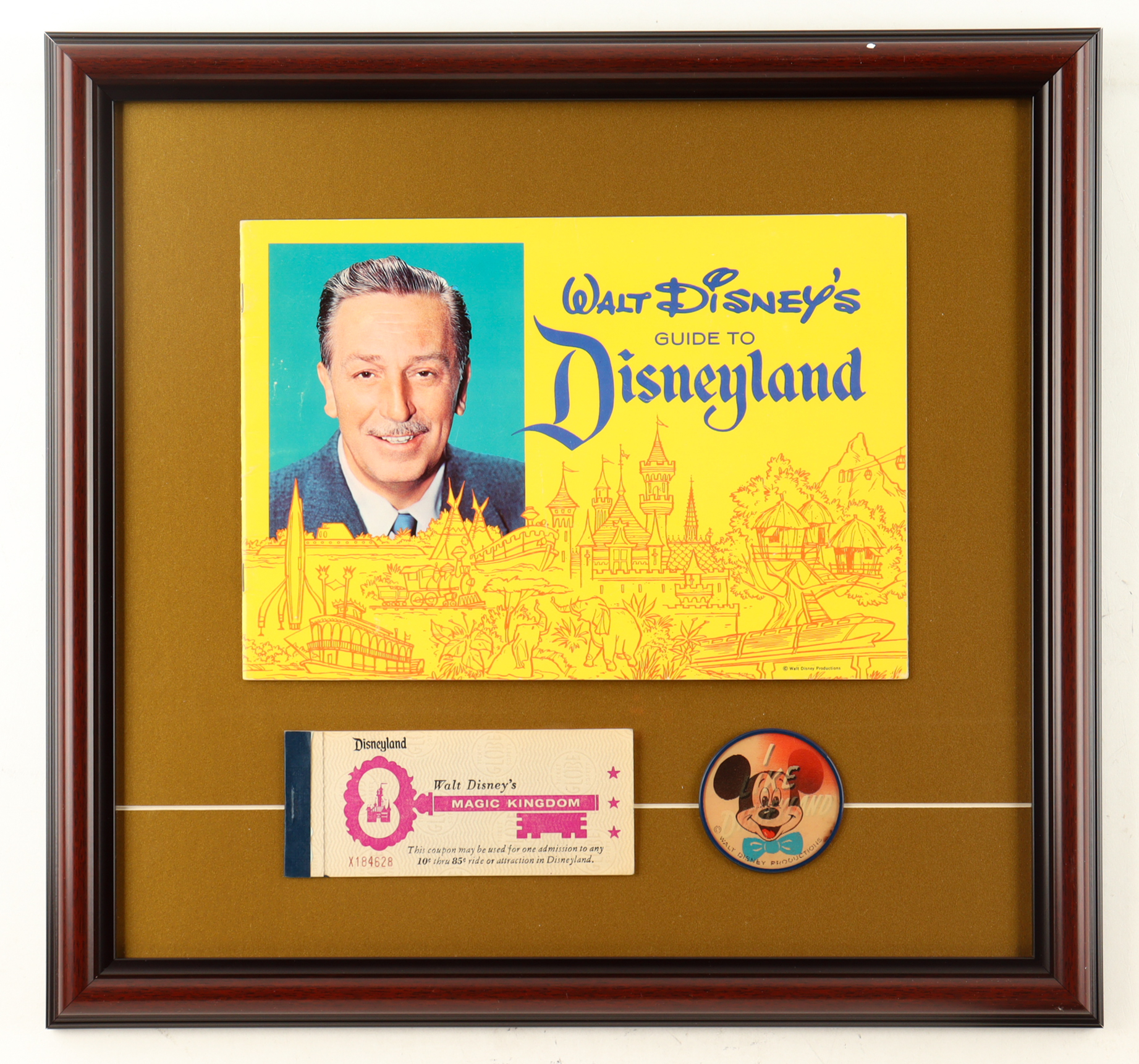 1963 "Walt Disney's Guide To Disneyland" Custom Framed Guide Display with Blinker Pin & Ticket Book at PristineAuction.com 1963 "Walt Disney's Guide To Disneyland" Custom Framed Guide Display with Blinker Pin & Ticket Book at PristineAuction.com