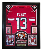 Brock Purdy Signed 49ers Custom Framed LED Backlit Nike Jersey Display & (2) PSA 10 Graded Rookie Cards (Fanatics) at PristineAuction.com