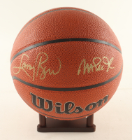 Magic Johnson & Larry Bird Signed NBA Logo Basketball with Display Stand (Beckett & PSA) at PristineAuction.com