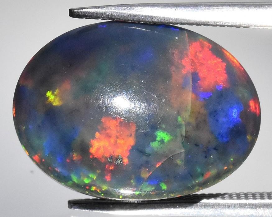 7.16 Carats Natural Black Opal Loose | $3,500 Estimated Retail Value (UGL & IGI Certs) at PristineAuction.com 7.16 Carats Natural Black Opal Loose | $3,500 Estimated Retail Value (UGL & IGI Certs) at PristineAuction.com