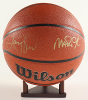 Magic Johnson & Larry Bird Signed NBA Basketball with Stand (PSA & Beckett) at PristineAuction.com