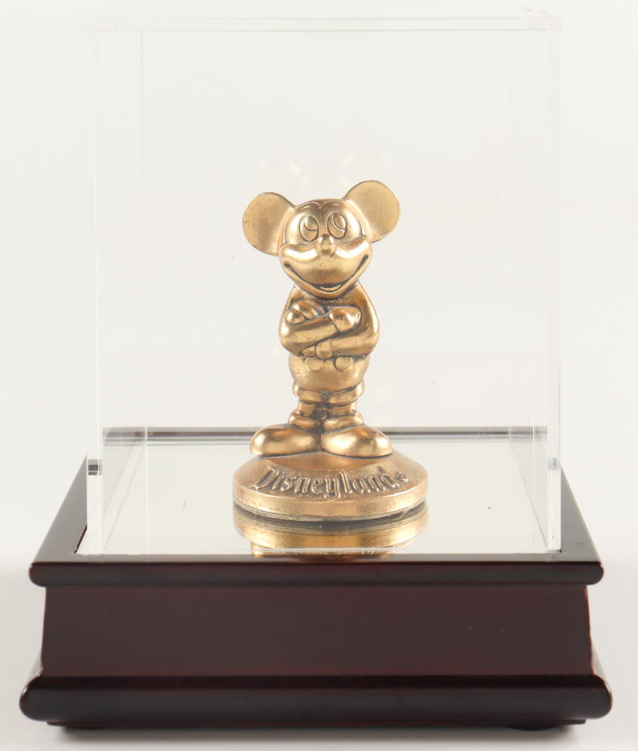 Vintage Mickey Mouse Brass Figurine Paperweight Souvenir with Display Case at PristineAuction.com Vintage Mickey Mouse Brass Figurine Paperweight Souvenir with Display Case at PristineAuction.com