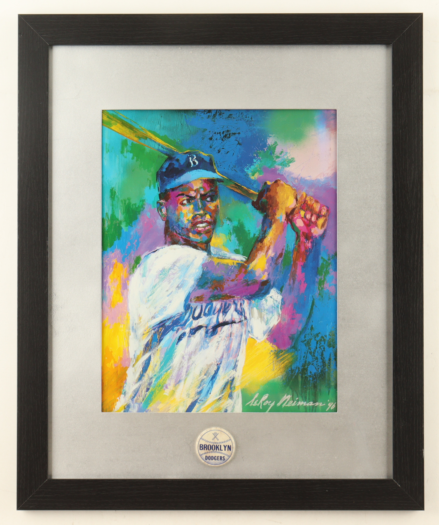 "Jackie Robinson" Custom Framed Neiman Art Print Display with 1955 Vintage Brooklyn Dodgers Pin at PristineAuction.com "Jackie Robinson" Custom Framed Neiman Art Print Display with 1955 Vintage Brooklyn Dodgers Pin at PristineAuction.com