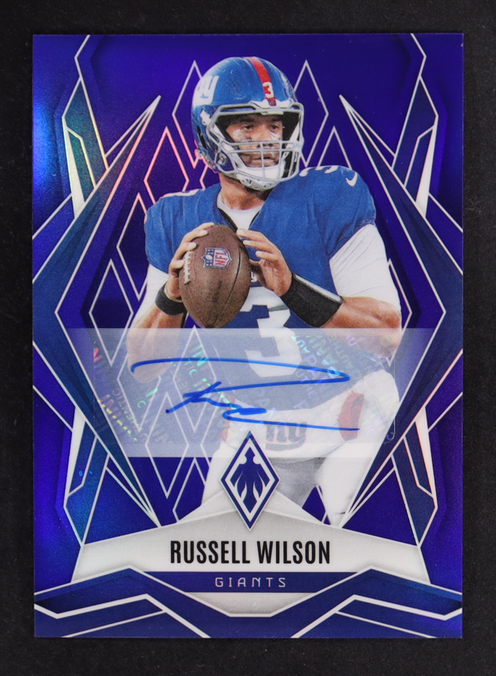 Russell Wilson 2025 Panini Phoenix Autographs Blue #28 #35/49 at PristineAuction.com Russell Wilson 2025 Panini Phoenix Autographs Blue #28 #35/49 at PristineAuction.com