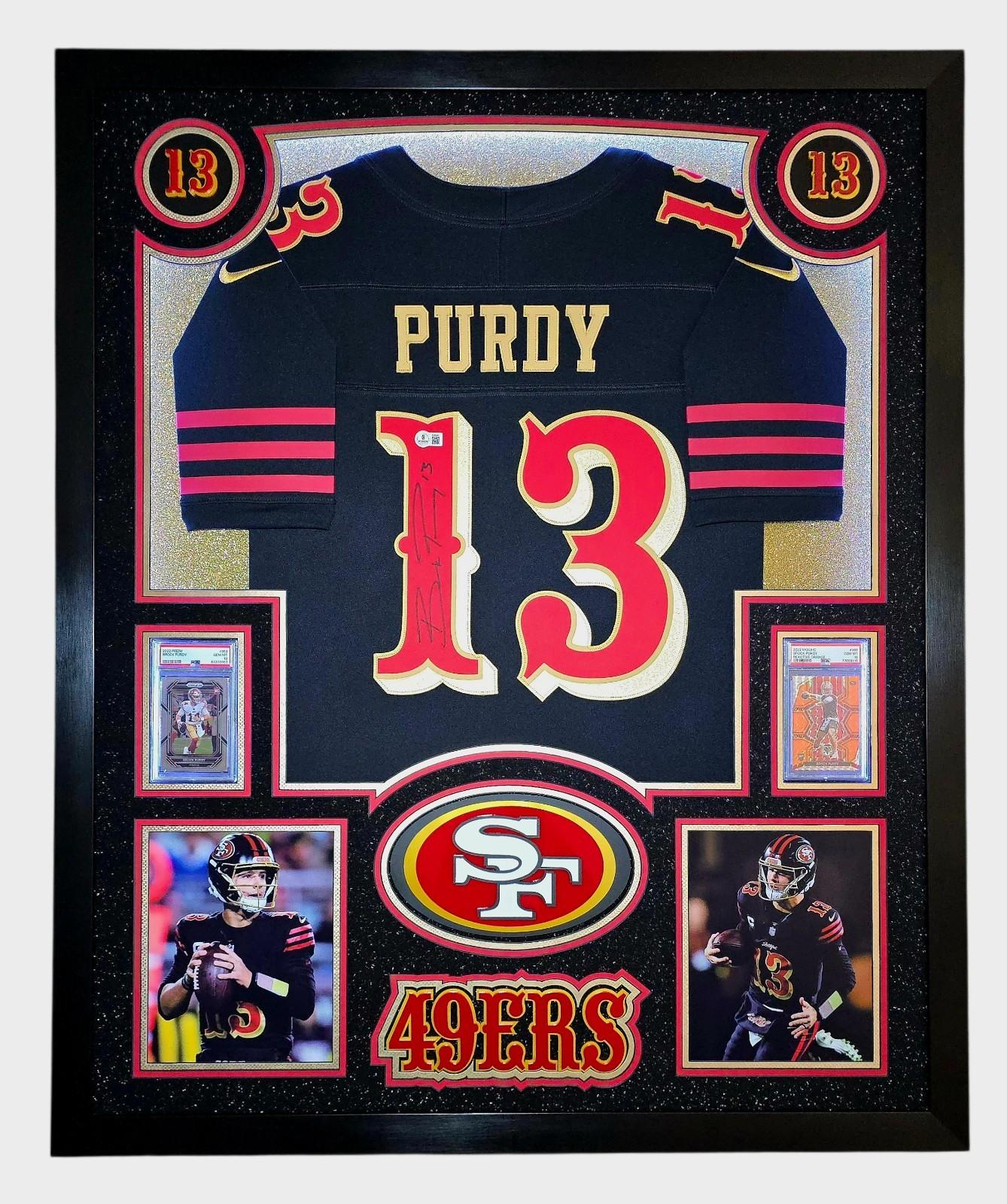 Brock Purdy Signed 49ers Custom Framed Nike Jersey with LED Display & (2) PSA 10 Graded Rookie Cards (Beckett) at PristineAuction.com Brock Purdy Signed 49ers Custom Framed Nike Jersey with LED Display & (2) PSA 10 Graded Rookie Cards (Beckett) at PristineAuction.com