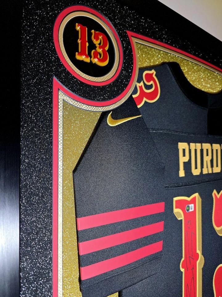 Brock Purdy Signed 49ers Custom Framed Nike Jersey with LED Display & (2) PSA 10 Graded Rookie Cards (Beckett) at PristineAuction.com Brock Purdy Signed 49ers Custom Framed Nike Jersey with LED Display & (2) PSA 10 Graded Rookie Cards (Beckett) at PristineAuction.com