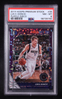 Luka Doncic 2019-20 Hoops Premium Stock Prizms Purple Disco #39 (PSA 8) at PristineAuction.com