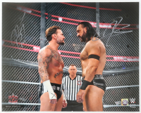 CM Punk & Drew McIntyre Signed WWE 16x20 Photo (Fanatics) at PristineAuction.com