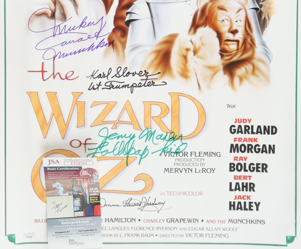 "The Wizard of Oz" 16x24 Poster Cast-Signed by (4) with Mickey Carroll, Jerry Maren, Karl Slover, & Donna Stewart Hardway Inscribed "Munchkin", "1st Trumpeter", & "Lollipop Kid" (JSA) at PristineAuction.com "The Wizard of Oz" 16x24 Poster Cast-Signed by (4) with Mickey Carroll, Jerry Maren, Karl Slover, & Donna Stewart Hardway Inscribed "Munchkin", "1st Trumpeter", & "Lollipop Kid" (JSA) at PristineAuction.com