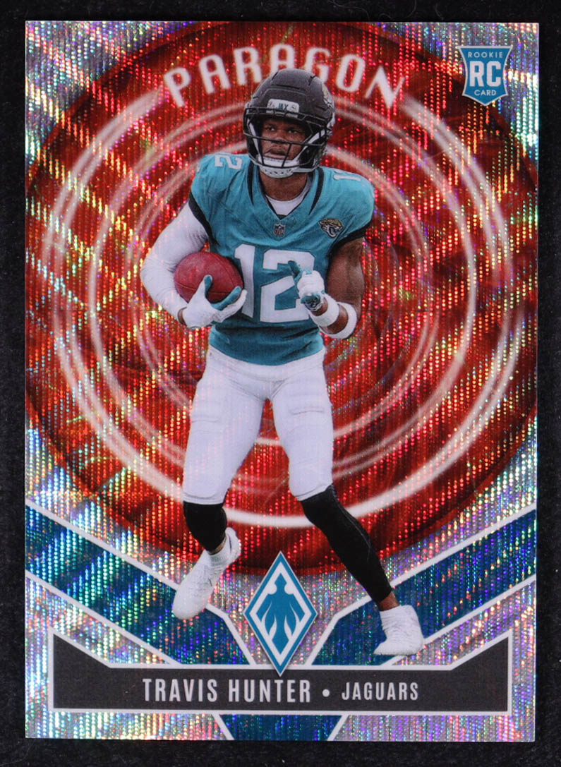 Travis Hunter 2025 Panini Phoenix Paragon Silver Hyper #12 #184/299 RC at PristineAuction.com Travis Hunter 2025 Panini Phoenix Paragon Silver Hyper #12 #184/299 RC at PristineAuction.com