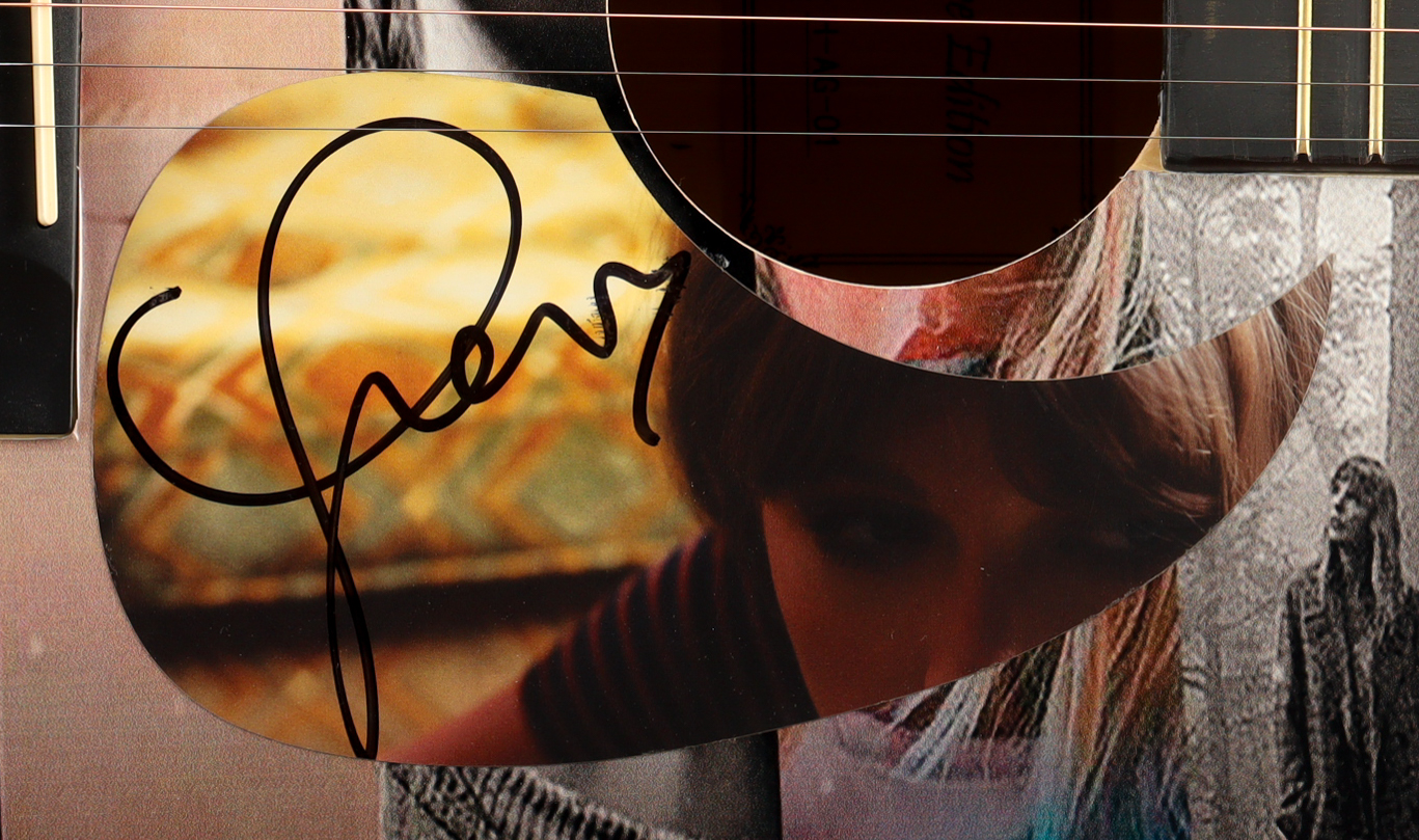 Taylor Swift Guitar with Signed Custom Insert Pickguard (AutographCOA) at PristineAuction.com Taylor Swift Guitar with Signed Custom Insert Pickguard (AutographCOA) at PristineAuction.com
