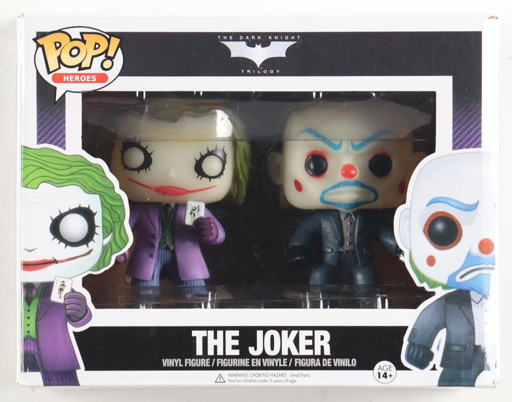 "The Dark Knight Trilogy" The Joker Two-Pack Funko Pop! Vinyl Figures at PristineAuction.com "The Dark Knight Trilogy" The Joker Two-Pack Funko Pop! Vinyl Figures at PristineAuction.com
