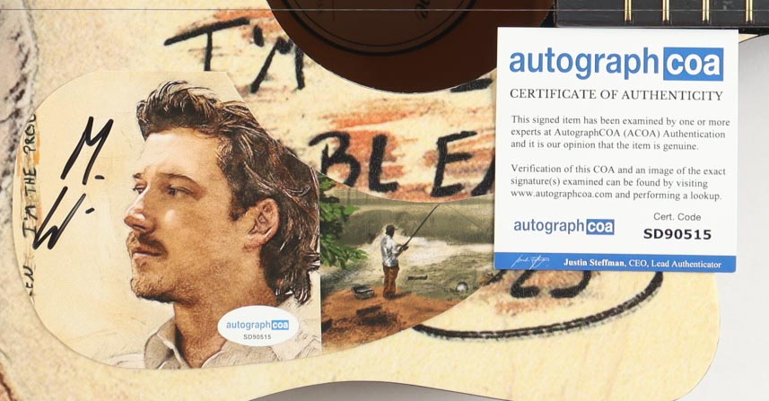 Morgan Wallen Guitar with Signed Custom Insert Pickguard (ACOA) at PristineAuction.com Morgan Wallen Guitar with Signed Custom Insert Pickguard (ACOA) at PristineAuction.com