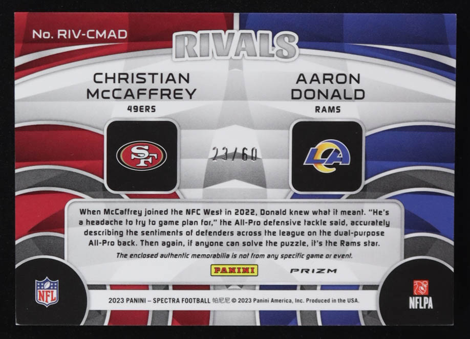 Christian McCaffrey / Aaron Donald 2023 Panini Spectra Rivals Materials Neon Blue #8 #23/60 at PristineAuction.com Christian McCaffrey / Aaron Donald 2023 Panini Spectra Rivals Materials Neon Blue #8 #23/60 at PristineAuction.com