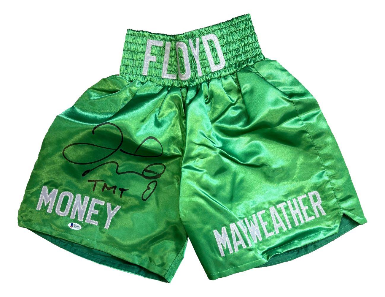 Floyd Mayweather Jr. Signed Boxing Trunks Inscribed "TMT" (Beckett) at PristineAuction.com Floyd Mayweather Jr. Signed Boxing Trunks Inscribed "TMT" (Beckett) at PristineAuction.com