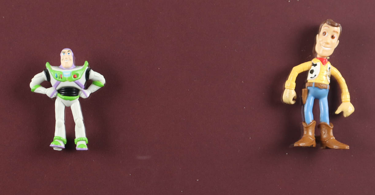 Disney's "Toy Story" Custom Framed Art Print Display with Woody & Buzz Figurines at PristineAuction.com Disney's "Toy Story" Custom Framed Art Print Display with Woody & Buzz Figurines at PristineAuction.com