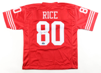 Jerry Rice Signed Jersey (Rice & Stacks of Plaques) at PristineAuction.com