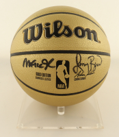 Larry Bird & Magic Johnson Signed NBA Basketball With Display Stand (PSA & Beckett) at PristineAuction.com