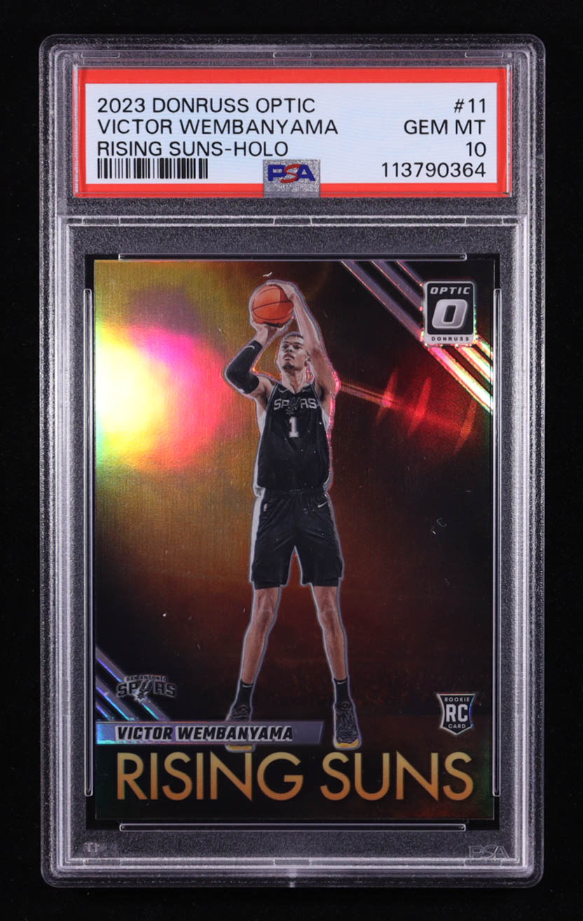 Victor Wembanyama 2023-24 Donruss Optic Rising Suns Holo #11 RC (PSA 10) at PristineAuction.com Victor Wembanyama 2023-24 Donruss Optic Rising Suns Holo #11 RC (PSA 10) at PristineAuction.com