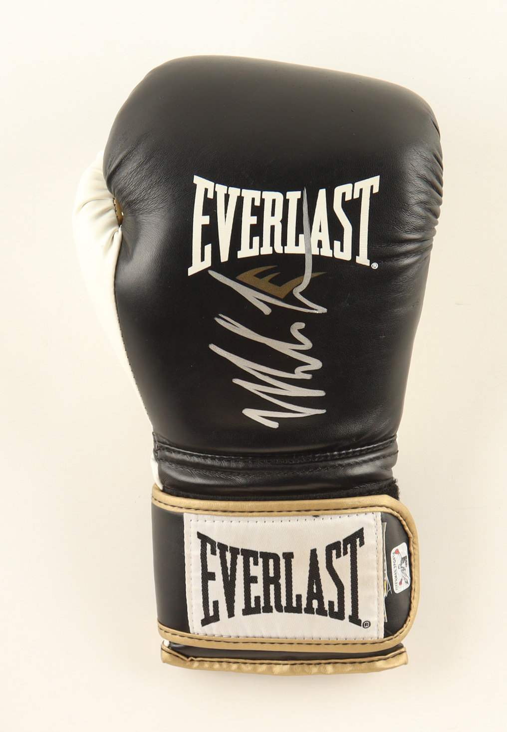 Mike Tyson Signed Everlast Boxing Glove with Display Stand (Tyson) at PristineAuction.com Mike Tyson Signed Everlast Boxing Glove with Display Stand (Tyson) at PristineAuction.com