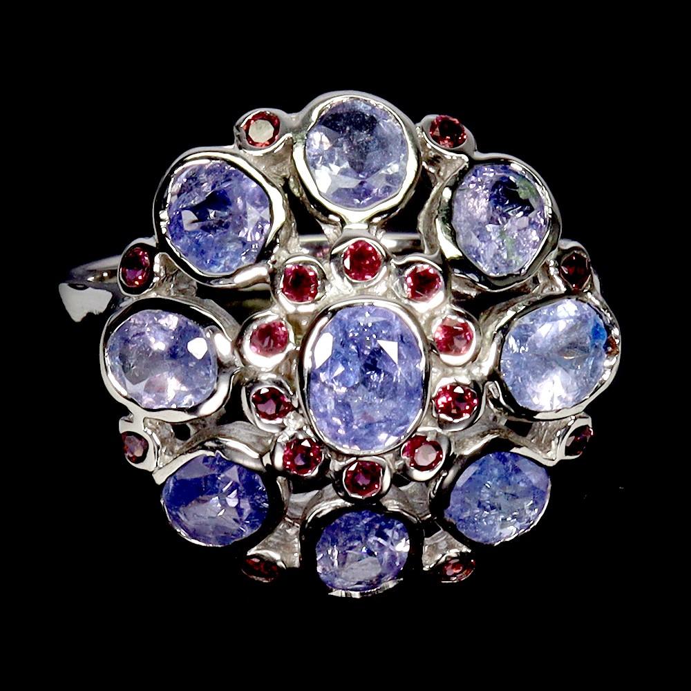 5.25 Carats Natural Tanzanite & Purple Garnet Ring | $2,500 Estimated Retail Value (UGL Cert) at PristineAuction.com 5.25 Carats Natural Tanzanite & Purple Garnet Ring | $2,500 Estimated Retail Value (UGL Cert) at PristineAuction.com