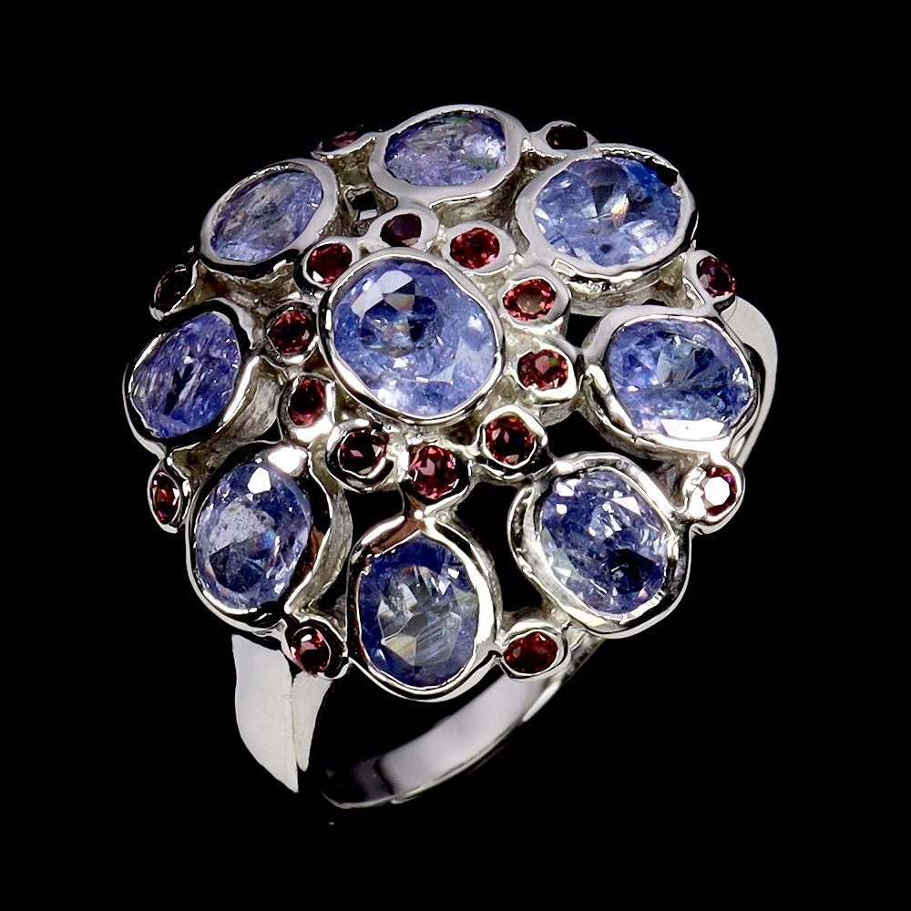 5.25 Carats Natural Tanzanite & Purple Garnet Ring | $2,500 Estimated Retail Value (UGL Cert) at PristineAuction.com 5.25 Carats Natural Tanzanite & Purple Garnet Ring | $2,500 Estimated Retail Value (UGL Cert) at PristineAuction.com