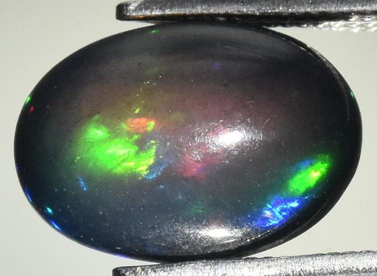 1.70 Carats Natural Black Opal Loose at PristineAuction.com 1.70 Carats Natural Black Opal Loose at PristineAuction.com