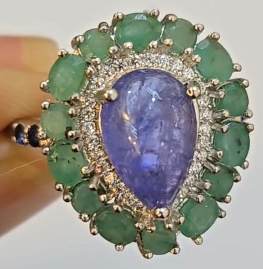 5.12 Carats Natural Tanzanite & Emerald Ring | $2,100 Estimated Retail Value (UGL Cert) at PristineAuction.com 5.12 Carats Natural Tanzanite & Emerald Ring | $2,100 Estimated Retail Value (UGL Cert) at PristineAuction.com