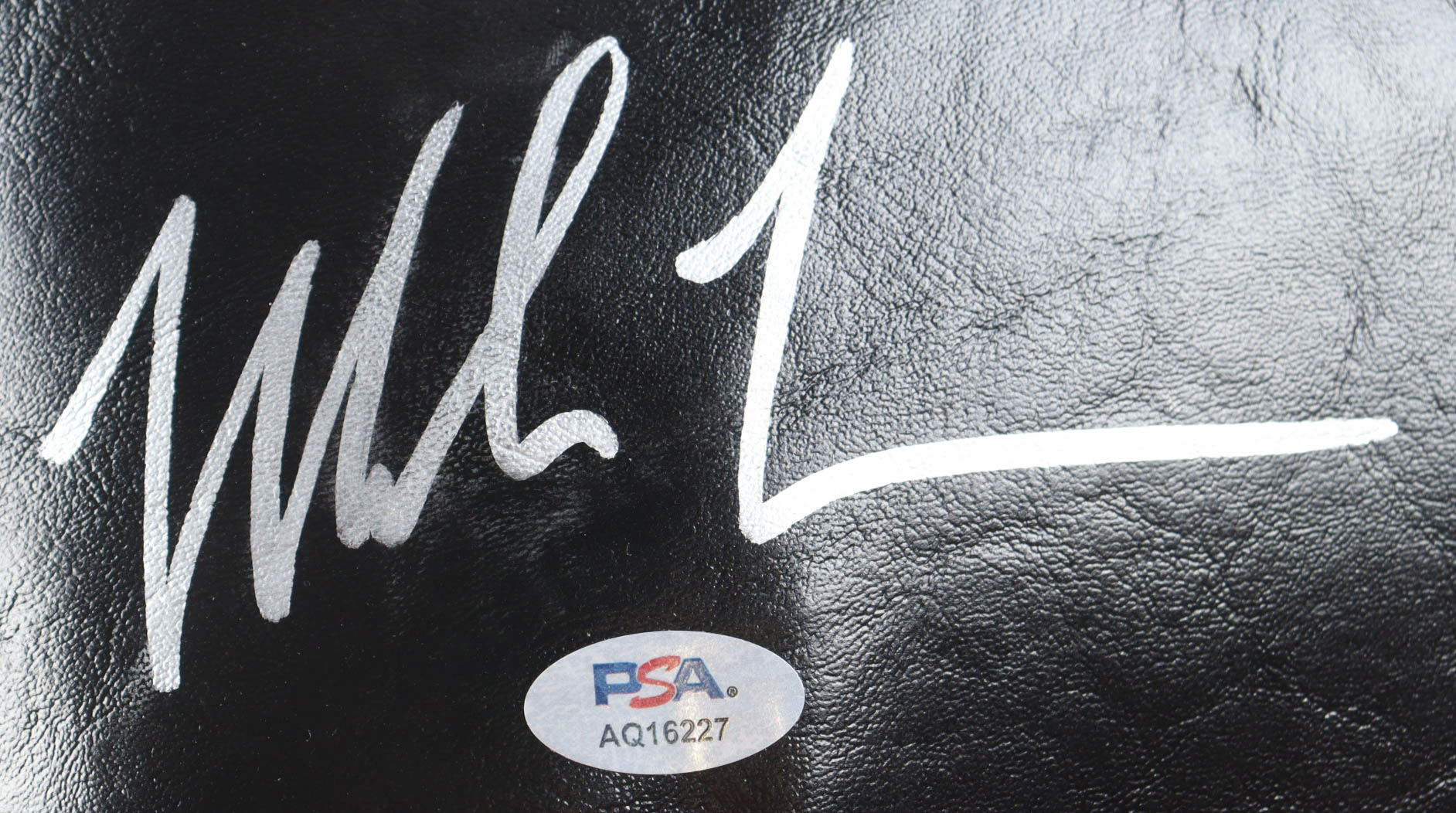 Mike Tyson Signed Hennessy Boxing Glove With Display Stand (PSA & Tyson) at PristineAuction.com Mike Tyson Signed Hennessy Boxing Glove With Display Stand (PSA & Tyson) at PristineAuction.com