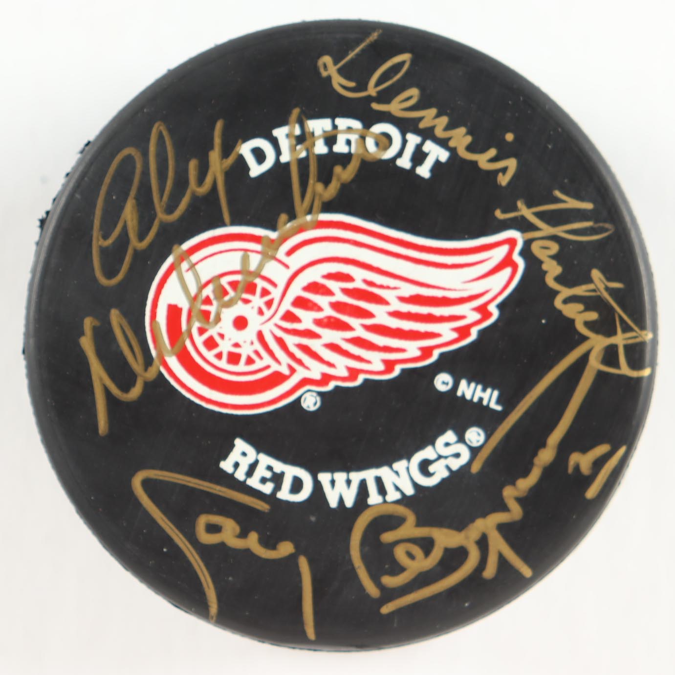 Alex Delvecchio, Gary Bergman & Dennis Hextall Signed Red Wings Logo Puck In Display Case (PSA) at PristineAuction.com Alex Delvecchio, Gary Bergman & Dennis Hextall Signed Red Wings Logo Puck In Display Case (PSA) at PristineAuction.com